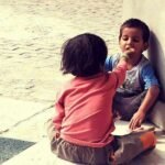 story of kindness, two kids sharing a meal