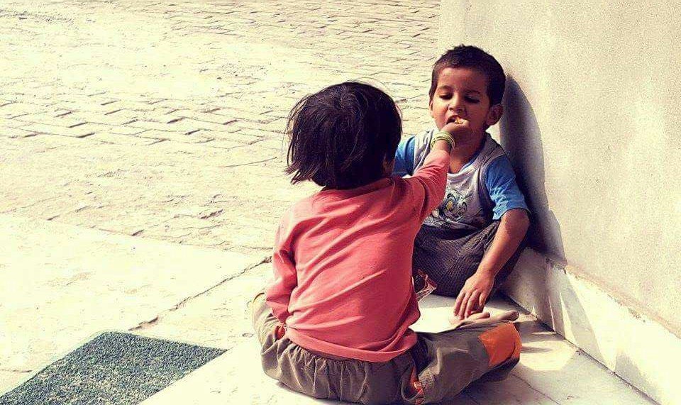 story of kindness, two kids sharing a meal